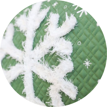 Circle Image, Closeup of chenille technique on Blizzard Bliss Pillow.